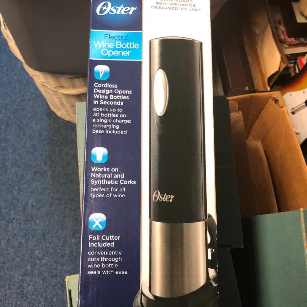 Never used Oster electric wine bottle opener